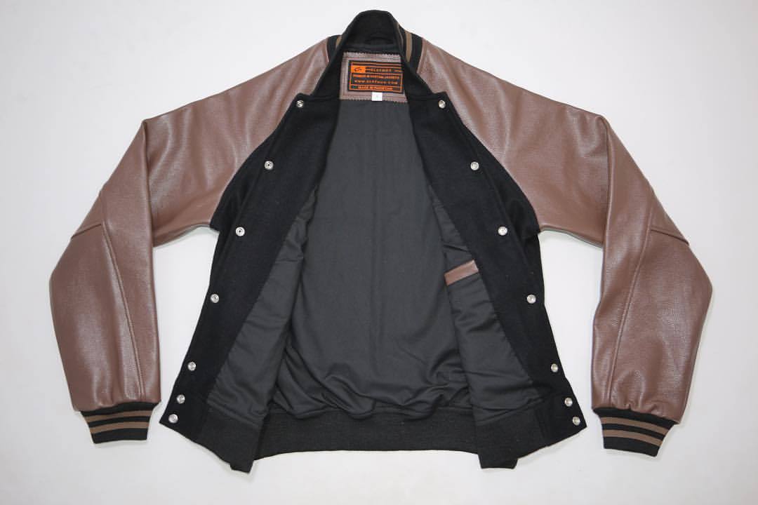 CLOTHOO — Customised varsity jacket in black wool and brown...