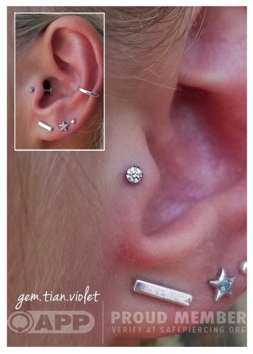 gem-tian-violet:Fresh tragus piercing with a white Swarovski...