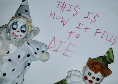 small but knowing clown doll