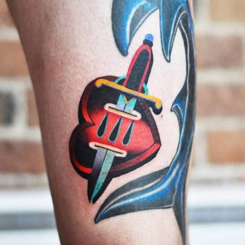 By David Côté, done at Imperial Tattoo Connexion, Montreal.... calf;davidcote;heart;contemporary;heart and dagger;love;facebook;twitter;pop art;medium size