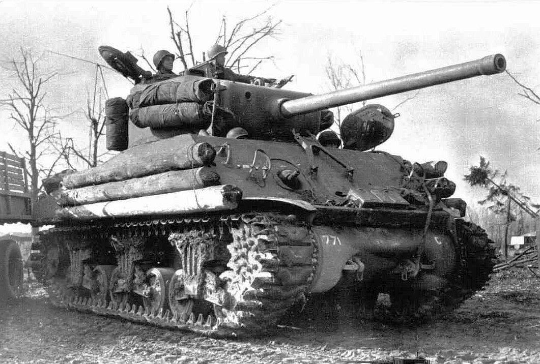 An American M4 Sherman armed with a 76mm long...