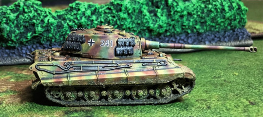 10 Tiger II moving by hedgerow, right side view