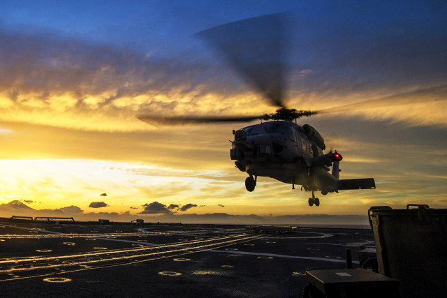 Military Armament | An MH-60R Seahawk landing on the flight deck of...