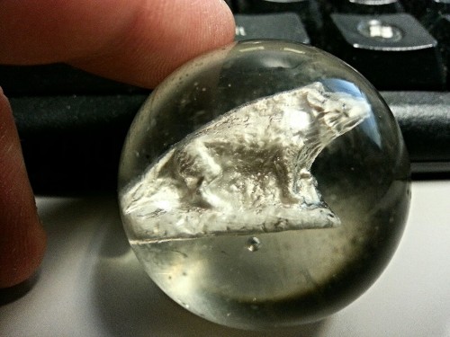 urban-detritus:Old glass marble with what looks like a dog...