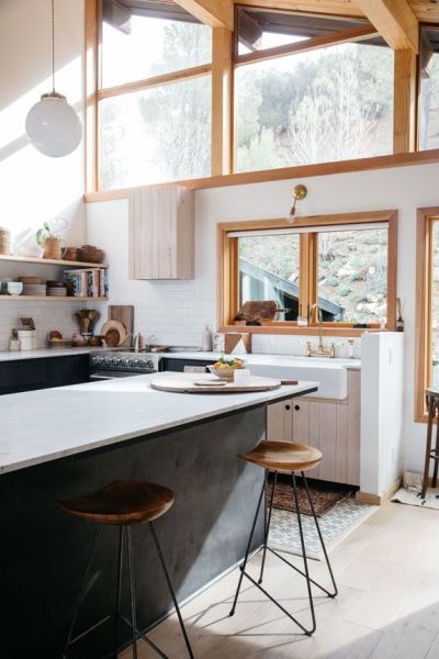 modern malibu hills kitchen with marble island and wood with wrought iron stools. / sfgirlbybay