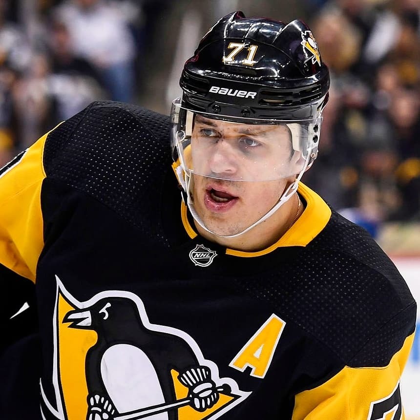 Random — Sidney Crosby bringing the Cup onto the ice during...