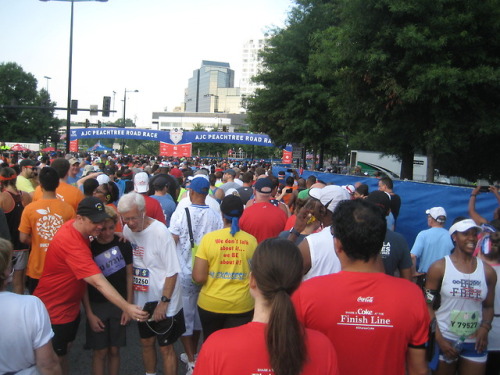 2018 Peachtree Road Race (Atlanta) Start. Holy Water Spray and...