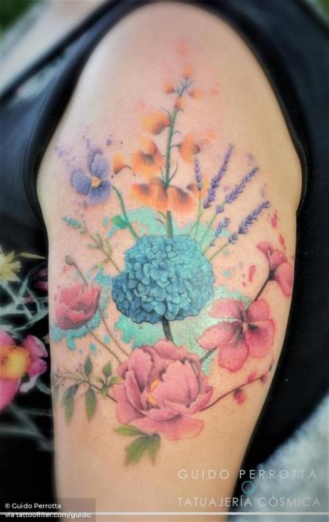 By Guido Perrotta, done at Tatuajería Cósmica, Buenos Aires.... flower;guido;flower bouquet;watercolor;hydrangea;facebook;nature;twitter;medium size;illustrative;upper arm