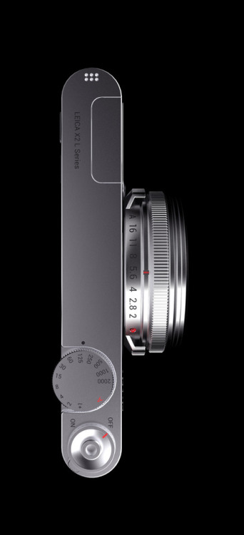 Leica Agustin Bernaudo electronics silver metal grey camera function button color accent red grip top view