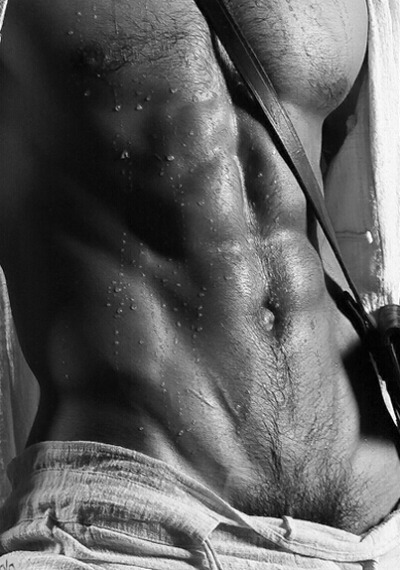 Looks like he got caught in a rainstorm. Beautiful abs!