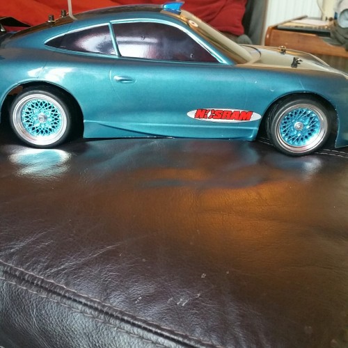 my 1/10th nitro tamiya car with Porsche body and new wheels