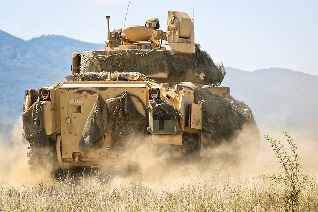 Military Armament | U.S. Army Soldiers and M2A3 Bradley Fighting...