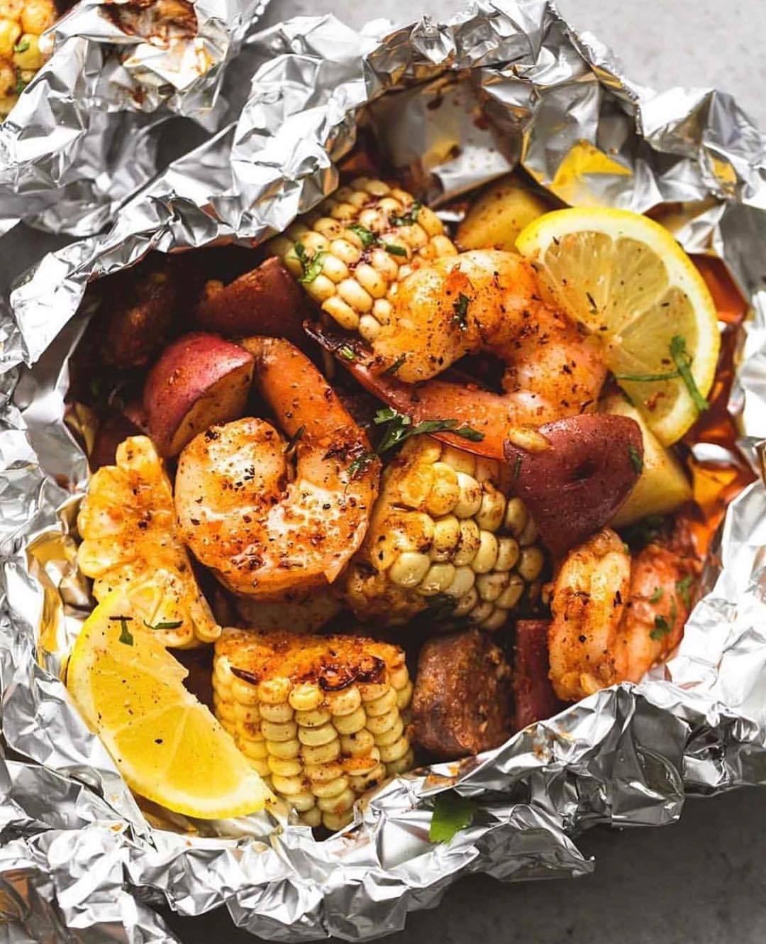 Shrimp Boil Foil Packs
By @cremedelacrumb1
Easy, tasty shrimp boil dinners baked or grilled in foil with homemade seasoning, fresh lemon, and brown butter sauce.
INGREDIENTS:
- 1 pound shrimp, peeled and de-veined
- 2 ears of corn on the cob,...