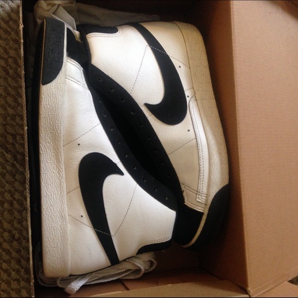 Chin Up, Fro Out — Black & white nike blazers. Shoe laces ate also...