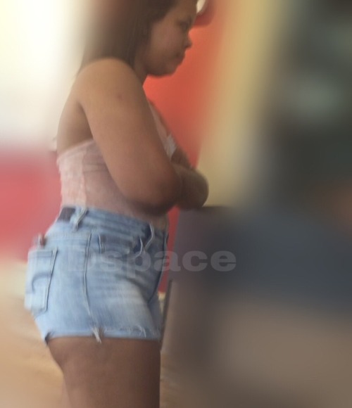 FAT ass Latina in shorts.