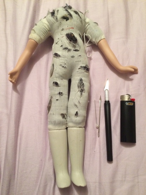 godswollen:my torture doll i tore off her head and poke her...