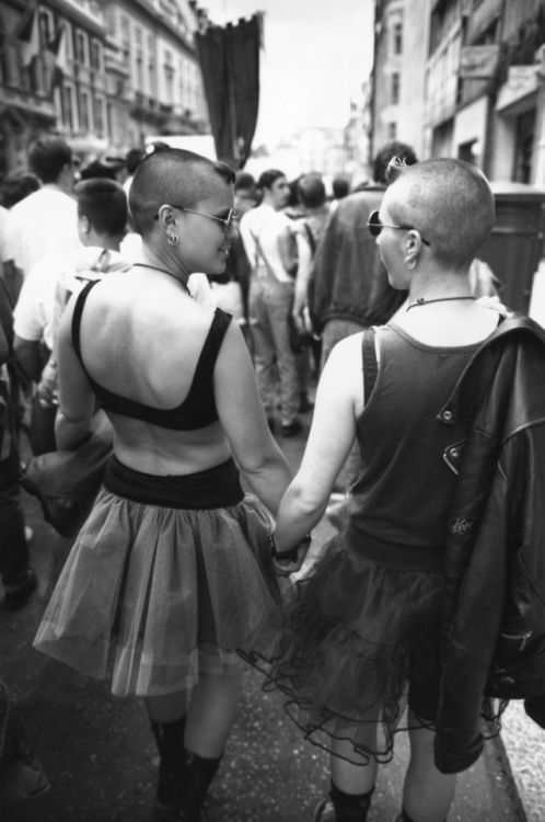 kristalknobb:A lesbian couple hold hands during the annual Gay...