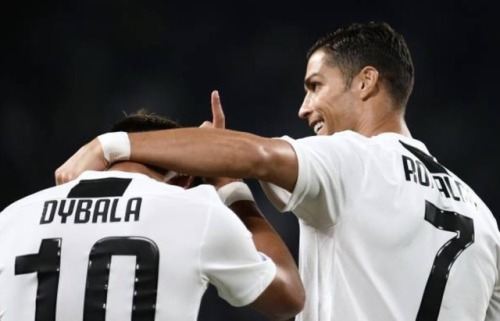 team-dybala:Paulo celebrating his goal with Ronaldo