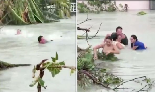 People are walking in the water to save their life.