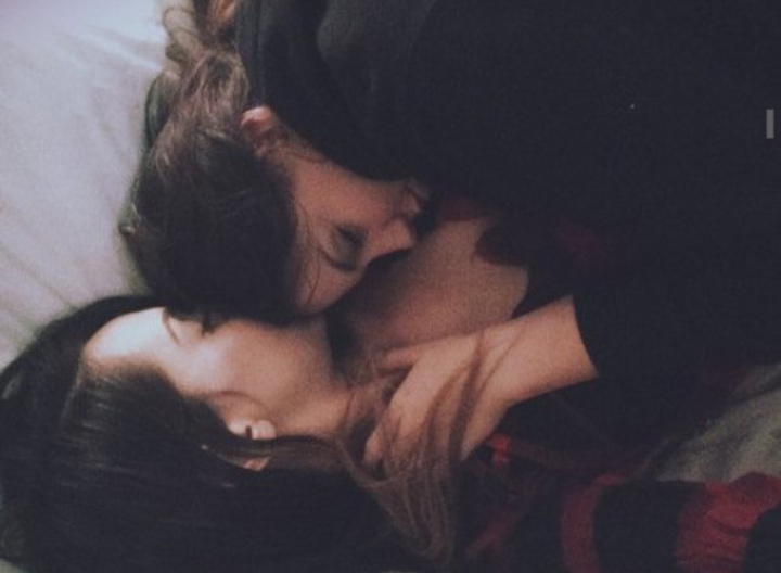 Lesbians Kissing On Bed