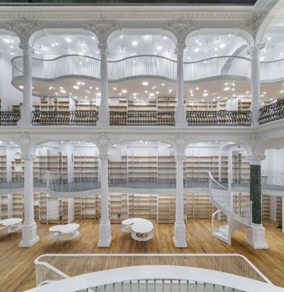 mymodernmet:<br /><br />This magnificent new bookstore is a treasure trove for literature lovers and architecture enthusiasts alike. Recently opened in Bucharest, Romania, the six-story Carousel of Light houses 10,000 books for sale. The building’s 19th-century façade and interior was restored to preserve its breathtaking details. With a first-floor modern art gallery and top-floor bistro included in the facility, the Carousel of Light truly incorporates a sampling of the best of fine arts and culture.