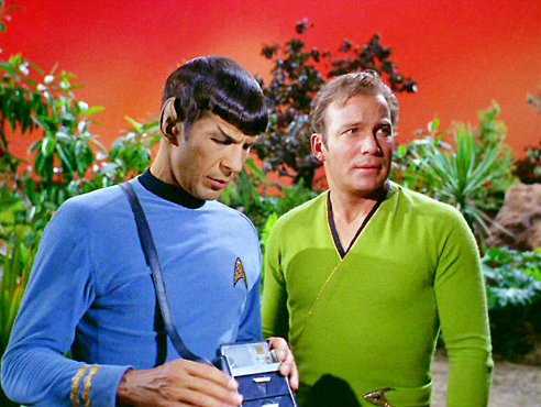 Spock/Kirk — Spock doing science stuff and Kirk standing behind...