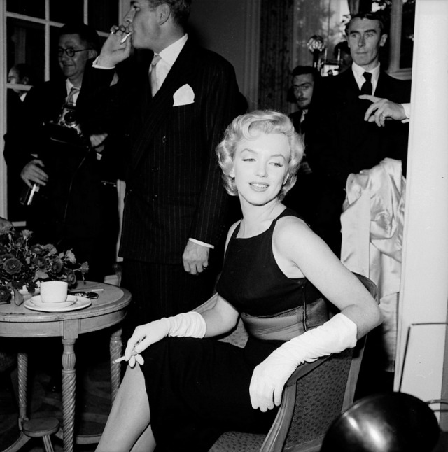 We Had Faces Then — Marilyn Monroe at an event in London, 1957, during...