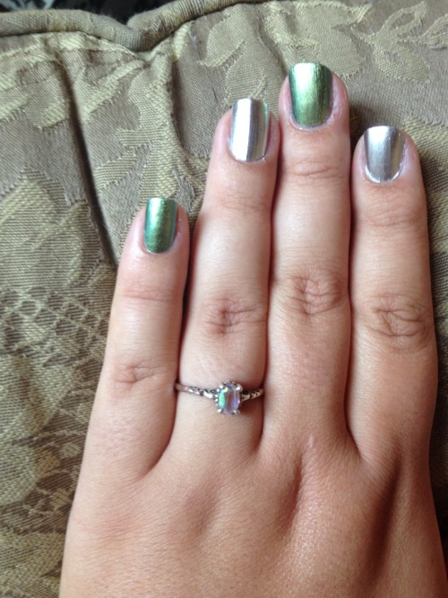 Green and silver! Goes pretty well with my ring :)