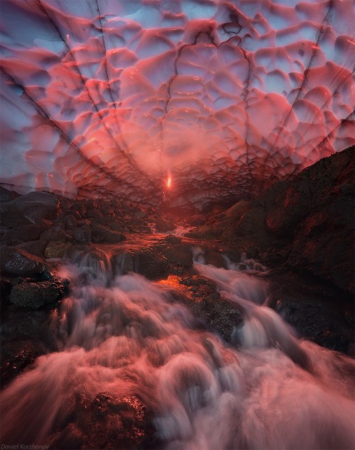 sixpenceee:Inside an ice cave underneath volcano. This is...