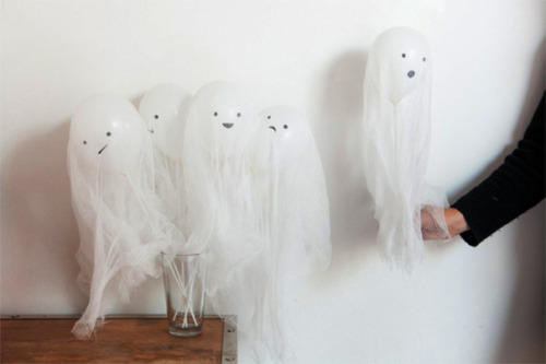 sixpenceee:Balloon ghost on a stick. Made with cheesecloth. A...