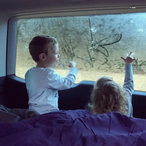 Drawing in the condensation on the rear window. Good times...