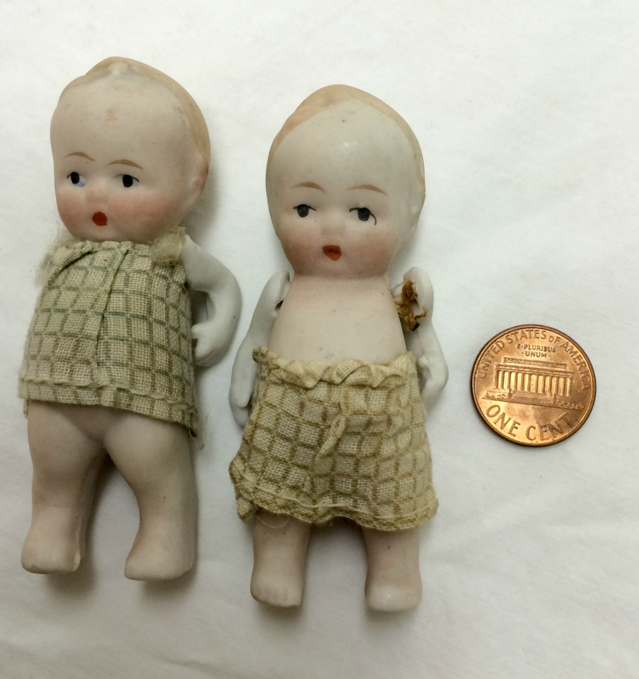 tiny porcelain dolls