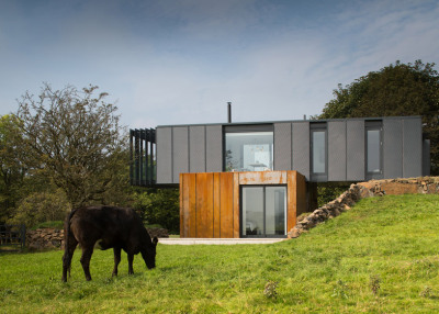 dezeen:<br /><br />A house made up of four stacked shipping containers »