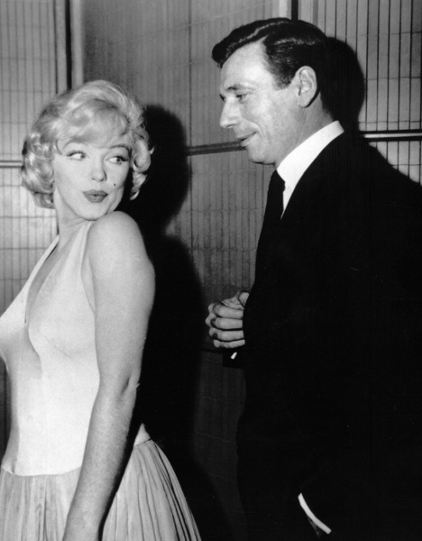 Marilyn Monroe and Yves Montand at a press party... - Eclectic Vibes