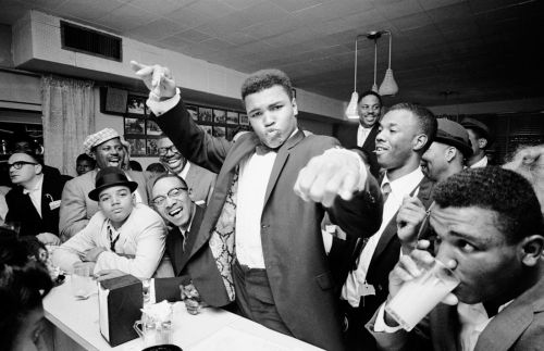 twixnmix:Muhammad Ali celebrating with Malcolm X at the...