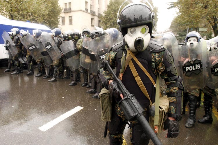 : Georgian riot police approach opposition...