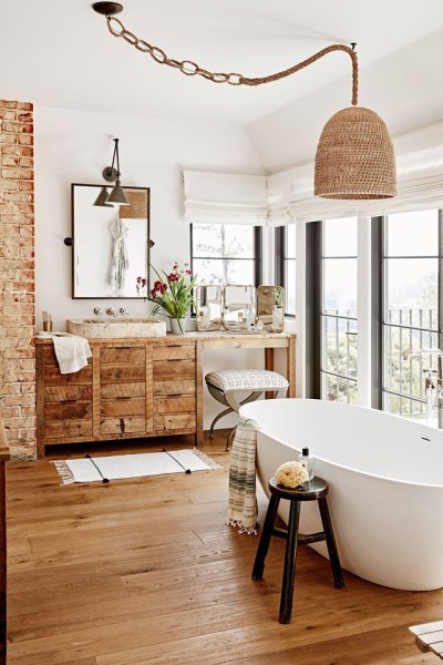 Warm bathroom uses a mix of exposed brick, wicker and natural wood in this home in Hollywood Hills, Ca. [2000 × 3000]