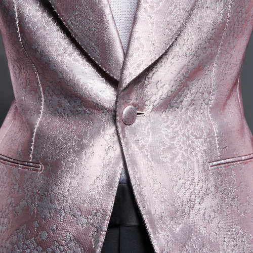 A close up look of the Atticus Cocktail Jacket crafted of a pink...