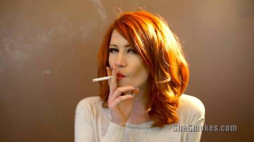 kccouple4bigf:Ya gotta love a smokin redhead 