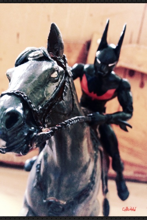 batman riding horse statue