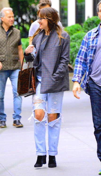 dailymels:Dakota Johnson is seen out and about in Manhattan...