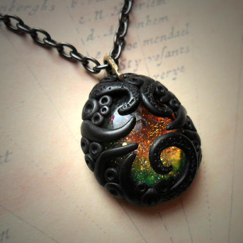 cthulhu-jewellery:For sale - handmade irridescent glass...