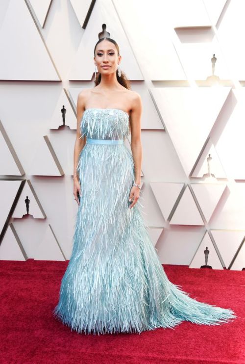 Elaine Welteroth in a beautiful strapless pastel blue a-line...