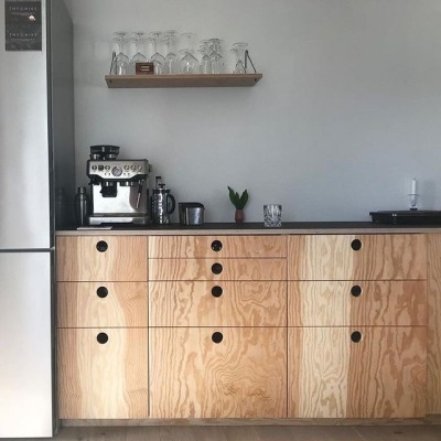 We have made fronts in plywood and table top with linoleum for this kitchen.