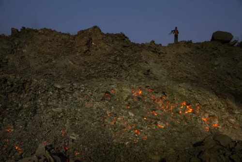 “THE EARTH IS ON FIRE”In Jharia, India, the...