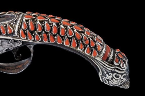 peashooter85:An original silver and coral mounted flintlock...