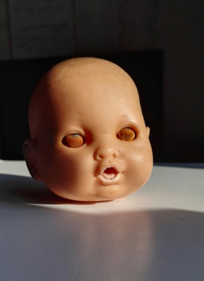 creepy baby doll head