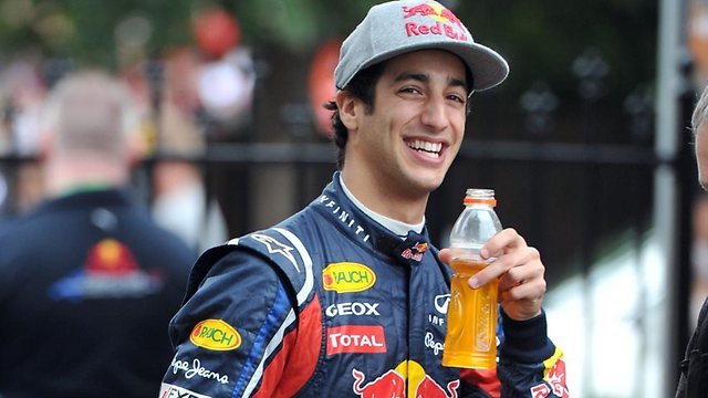 Daniel Ricciardo Smiling at Things: smiling at a sports drink