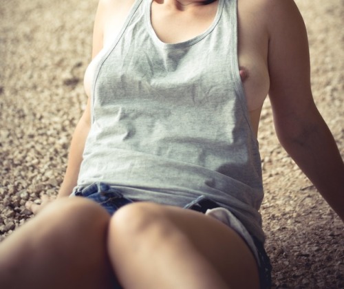 exisexyoutfit:lookmybodyme:Chilling in the park. Ups my nipple...
