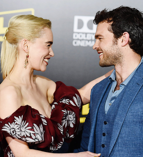 gifstarwars:Emilia Clarke and Alden Ehrenreich attend the...